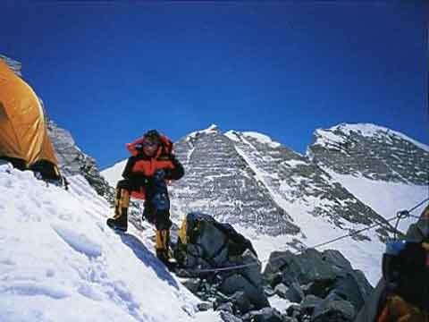
Jean-Christophe Lafaille at first bivouac on May 14, 2002 with Annapurna East and Main Summits beyond - Prisonnier de l'Annapurna book
